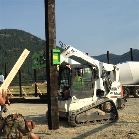 setting 646 square post with skid steer|post grabber skid steer.